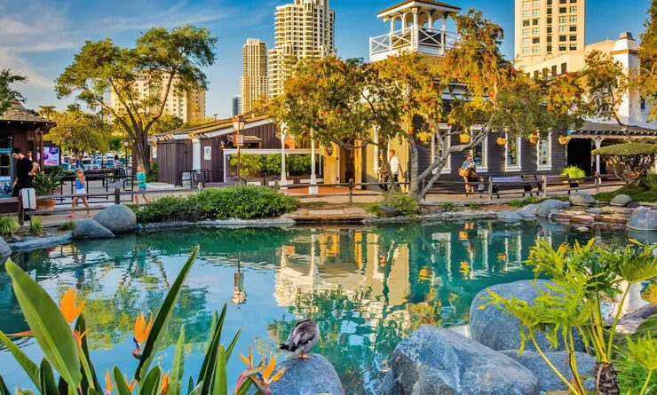 Seaport Village waterfront pond and shops in downtown San Diego
